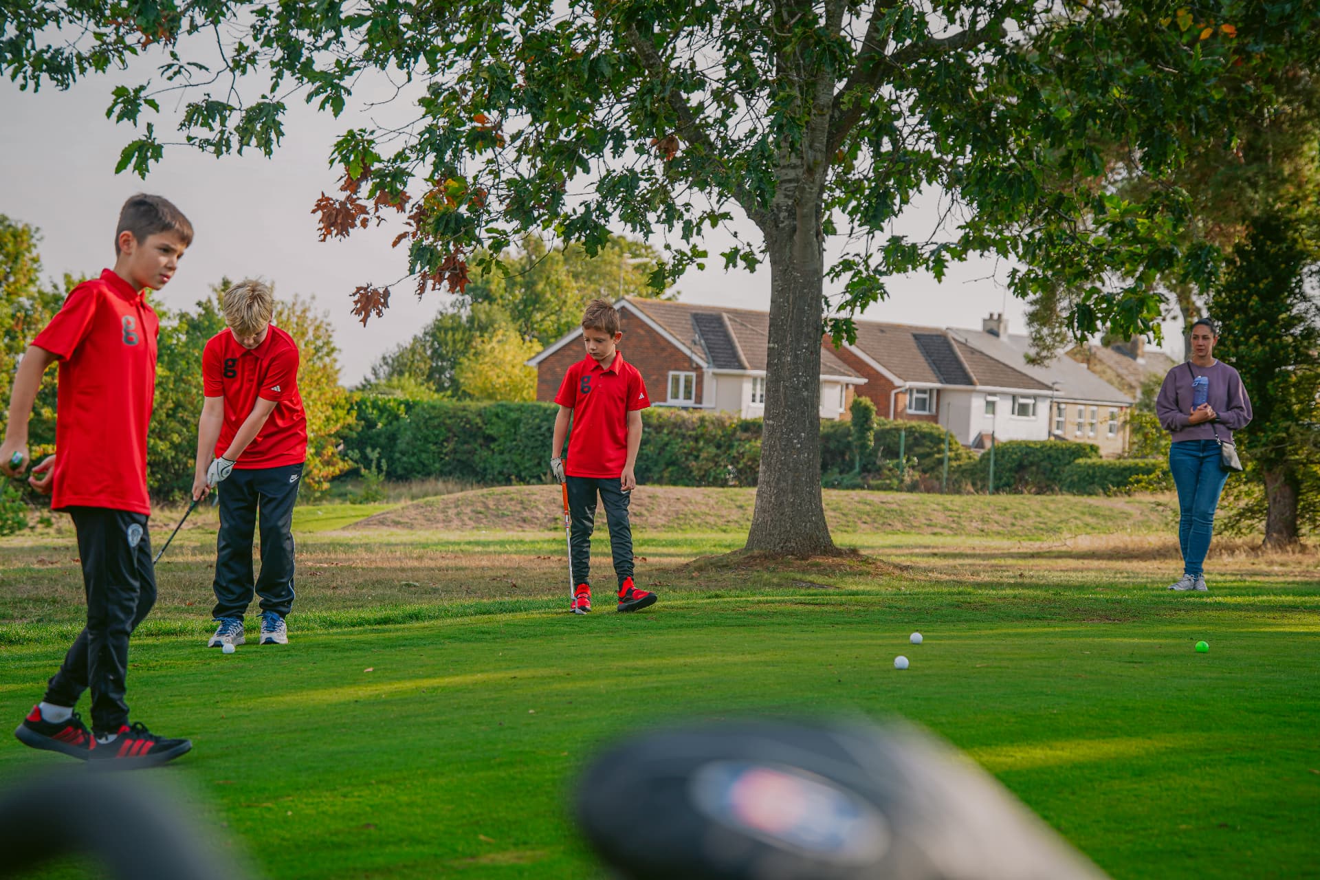 Golfstars children playing together on the golf course